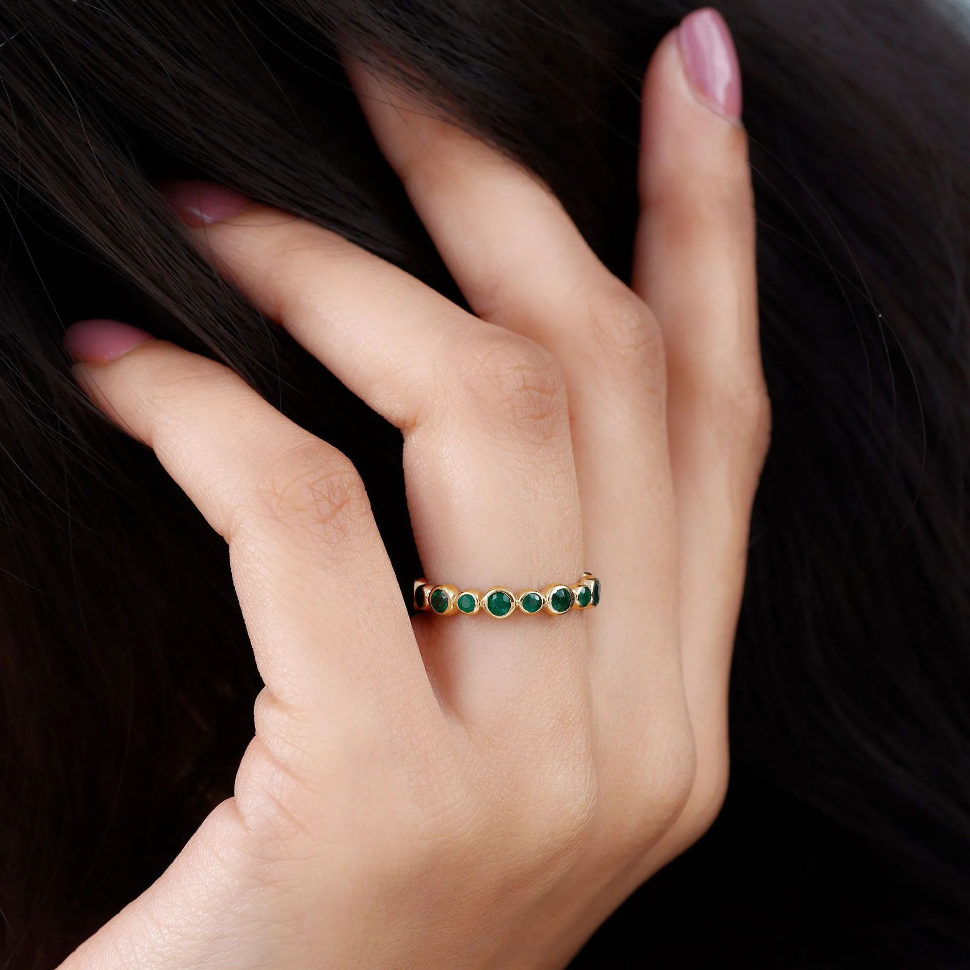 1 CT Emerald Uneven Eternity Ring in Bezel Setting